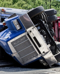 Due to their high center of gravity, semi-trucks can roll over easily.