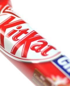 Kwidzyn, Poland - February 27, 2014: Kit Kat chocolate bar isolated on white background. Kit Kat bars are produced by Nestle. Brand Kit Kat was registered in 1911